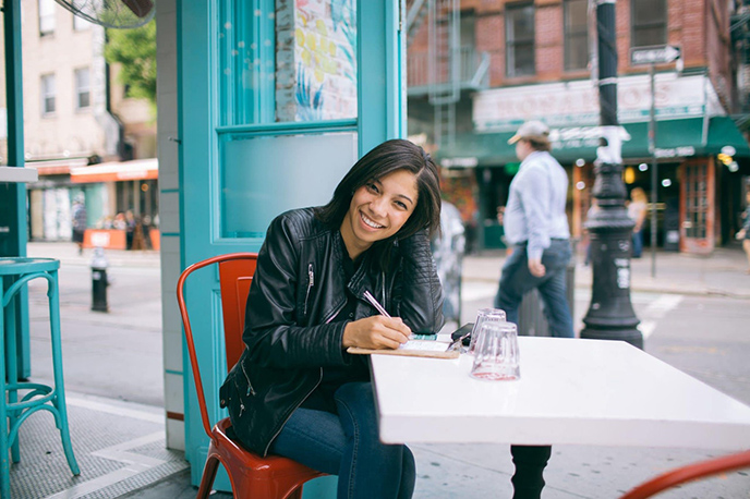 Woman Sitting in Red Chair Empathic Writing